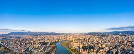 Taipei City Aerial View - Asia business concept image, panoramic modern cityscape building birds eye view under daytime and blue sky, shot in Taipei, Taiwan.の写真素材