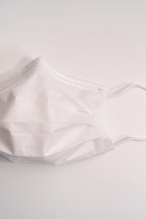 Protective medical mask on white background.