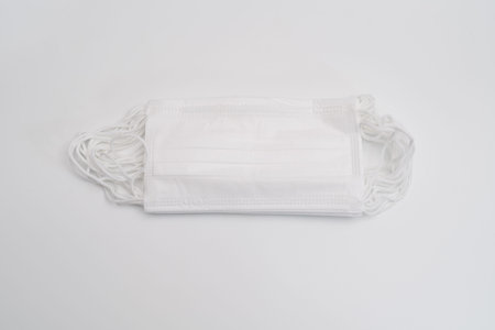 Protective medical mask on white background.