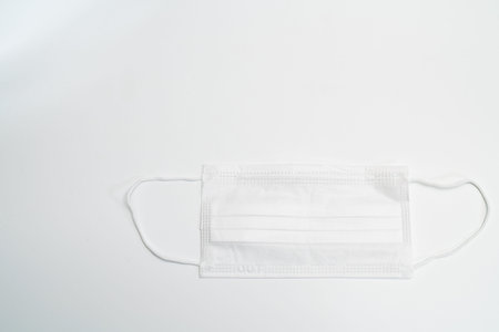 Protective medical mask on white background.