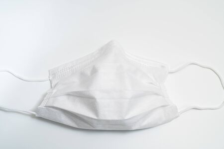 Protective medical mask on white background.の写真素材
