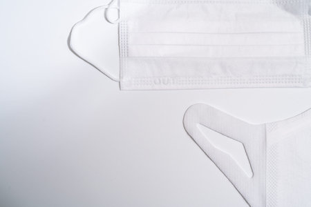 Protective medical mask on white background.