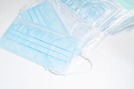 Surgical mask with rubber ear straps. Typical 3-ply surgical mask to cover the mouth and nose....