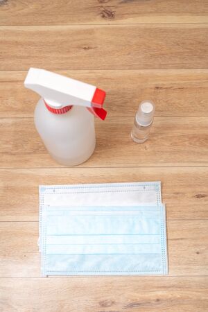 Protective face mask and sanitizer gel dispenser on white background, against Novel coronavirus (2019-nCoV) or Wuhan coronavirus and Influenza. Antiseptic, Hygiene and Healthcare conceptの写真素材