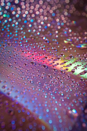 water drops on dvd media, water drops on colorful background