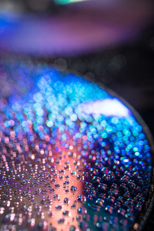 water drops on dvd media, water drops on colorful background