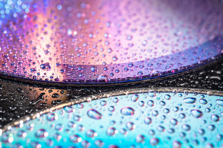 water drops on dvd media, water drops on colorful background