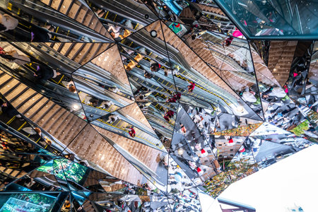 TOKYO, JAPAN-November 23, 2019: The modern design building interior with many reflection by mirrors at the entrance of Tokyu Mall in Omotesando Harajukuのeditorial素材