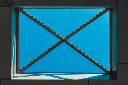 underside panoramic and perspective view to steel blue glass high rise building skyscrapers, business concept of successful industrial architectureの写真素材