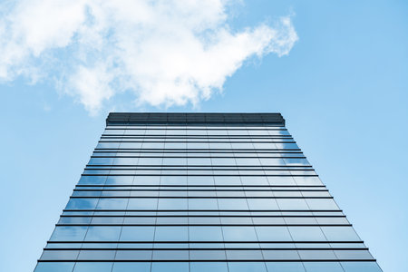 underside panoramic and perspective view to steel blue glass high rise building skyscrapers,...