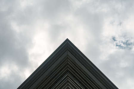 underside panoramic and perspective view to steel blue glass high rise building skyscrapers, business concept of successful industrial architectureの写真素材