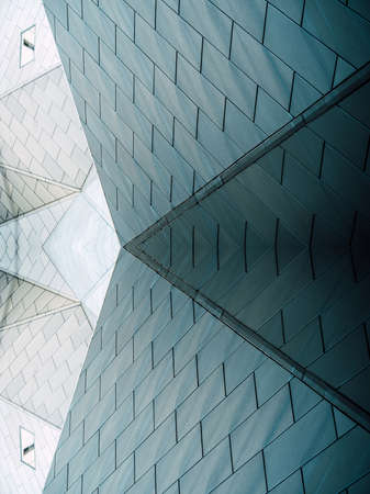 underside panoramic and perspective view to steel blue glass high rise building skyscrapers, business concept of successful industrial architectureの写真素材