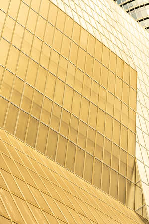 underside panoramic and perspective view to steel blue glass high rise building skyscrapers, business concept of successful industrial architectureの写真素材