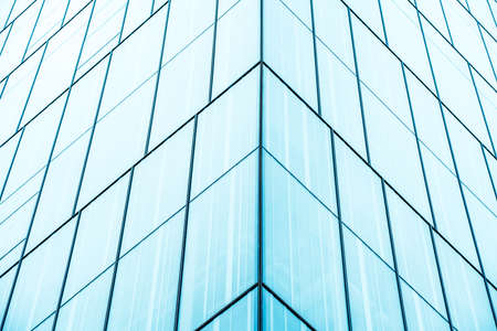 underside panoramic and perspective view to steel blue glass high rise building skyscrapers, business concept of successful industrial architectureの写真素材