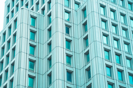 underside panoramic and perspective view to steel blue glass high rise building skyscrapers, business concept of successful industrial architectureのeditorial素材