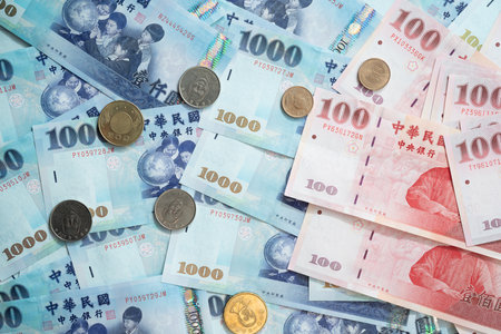 New Taiwan Dollar bill on white background. Red envelope packet chinese new year, hongbao on white background.の写真素材