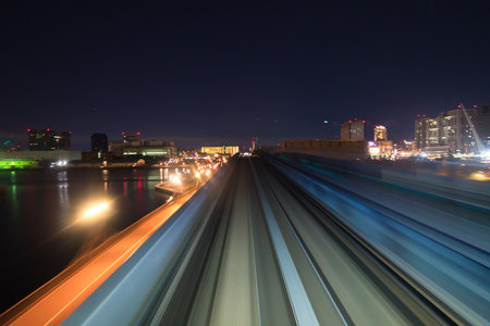 Motion blurred train moving inside tunnel with daylight in tokyo, japan.の写真素材