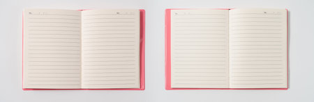Pink notebook on white desk. Business minimal concept for women. Flat lay, top view, copy spaceの写真素材