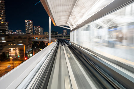 Motion blurred train moving inside tunnel with daylight in tokyo, japan.の写真素材