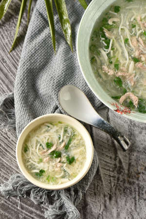 A small bowl of parsley beancurd soupの写真素材