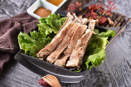 Shredded lamb chops with fresh green vegetablesの写真素材