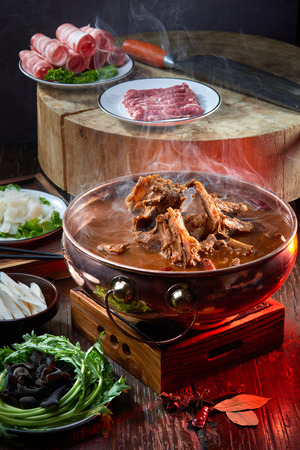 Sheep soup hot pot and side dishの写真素材