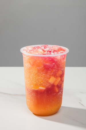 Mango mixed milk in a transparent glassの写真素材