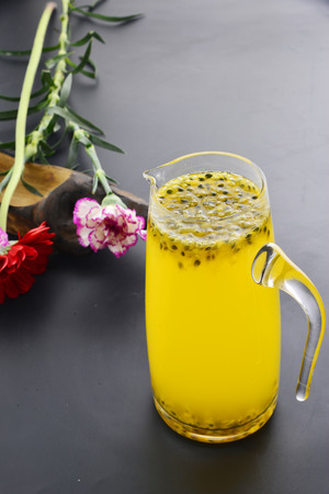 Freshly squeezed passion fruit juice in the potの写真素材
