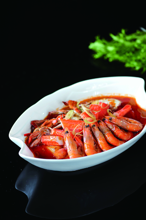 Tom Yam Gong Seafood in a white dishの写真素材