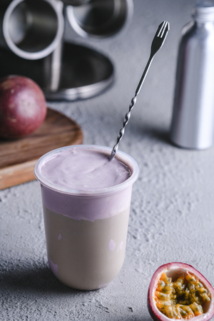 Passion fruit milkshake in a glassの写真素材