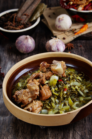 Fried pork chops with sauerkraut in a ceramic dishの写真素材