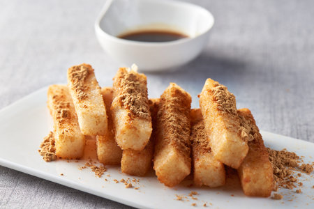 Brown sugar glutinous rice cake in a white dish