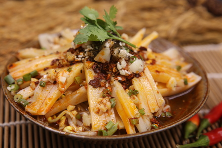 Sichuan spicy cold noodles in a ceramic dishの写真素材