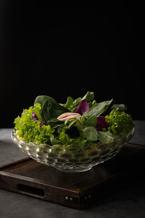 Fresh green vegetables in the transparent dishの写真素材