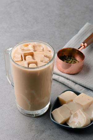 Hong Kong style milk tea with ice in a  glassの写真素材