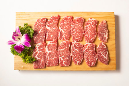 Fresh snow beef in a wooden dish