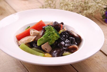 Oyster sauce eight treasures in a white ceramic dishの写真素材
