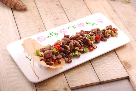 Steamed red kidney bean in a white ceramic dish