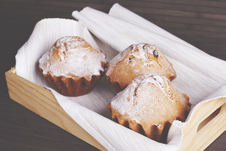Muffin cakes on a white tablecloth. Stock image.の写真素材