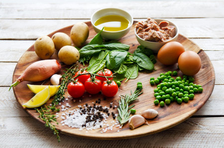 Fresh vegetables and ingredients for cooking tuna salad on the wooden