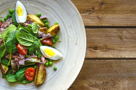Cooking tuna salad on the wooden plate. Stock image.の写真素材