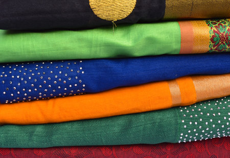 Indian traditional womens wear saree. Saree is so long and often embroidered with beads stones and...