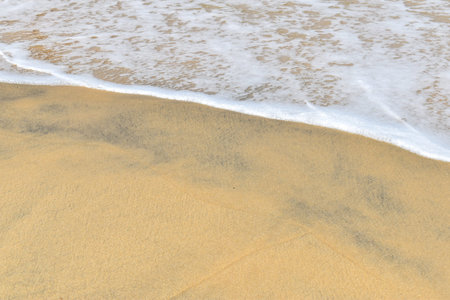 Tropical Sand beach background with long sand beach blue ocean and sky horizon india kerala varkala