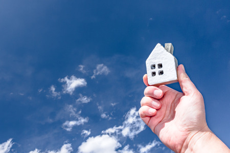 Get listed in the blue sky behind the Houseの写真素材