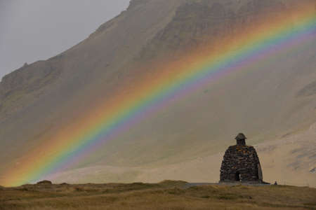 Rainbow over BÃ¡rÃ°ar Saga SnÃ¦fellsÃ¡ss StatueSnÃ¦fellsjÃ¶kull National Parkの写真素材