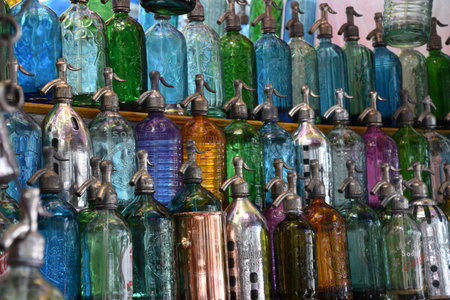 Colorful bottles of hand sanitizer for sale at a flea marketの写真素材