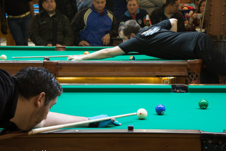 Unidentified players take part in a billiard tournament in Bangkok, Thailand.の写真素材