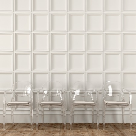Fashionable transparent chairs against a white wall with decorの写真素材