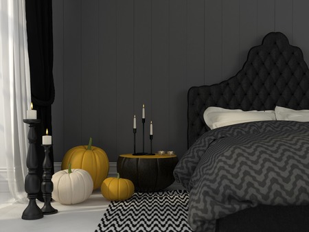 Classic black bedroom decorated with pumpkins and candles for Halloweenの写真素材