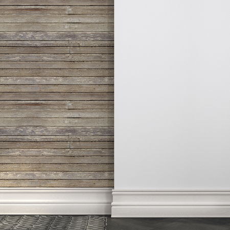 Background of a white plastered wall and a wall covered with boardsの写真素材